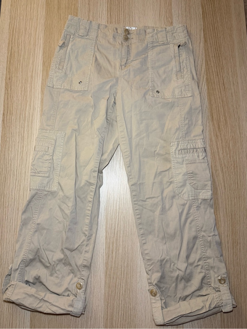 Women’s Tan cargo pants with adjustable waist and ankle straps